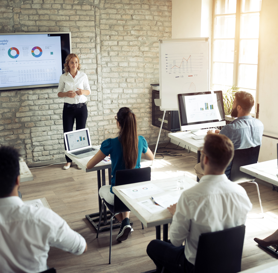 Group of adults studying in a classroom